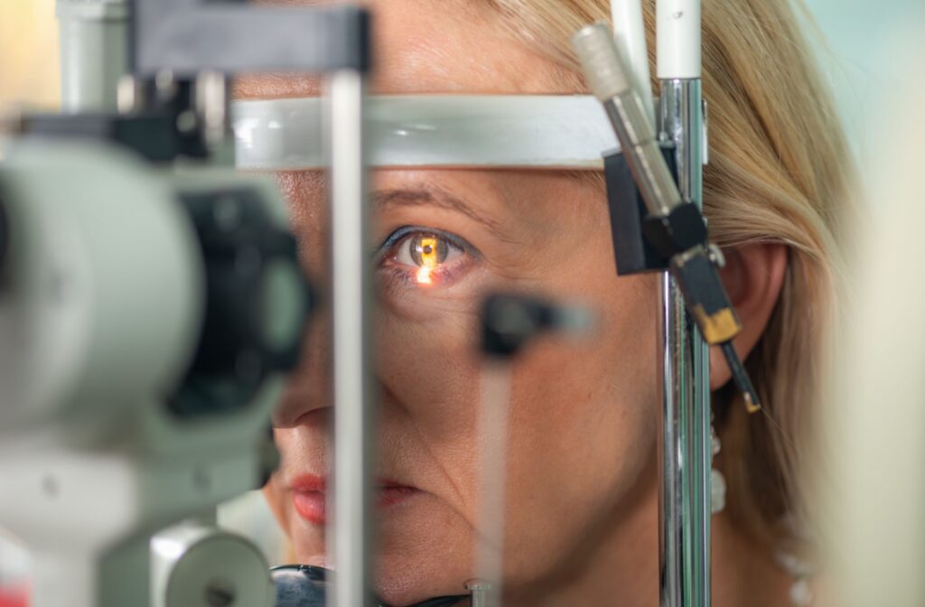 A close-up image of an older adult during an eye exam checking for signs of macular degeneration and glaucoma.